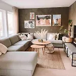 Family With Huge Terrace, Close To The Ocean